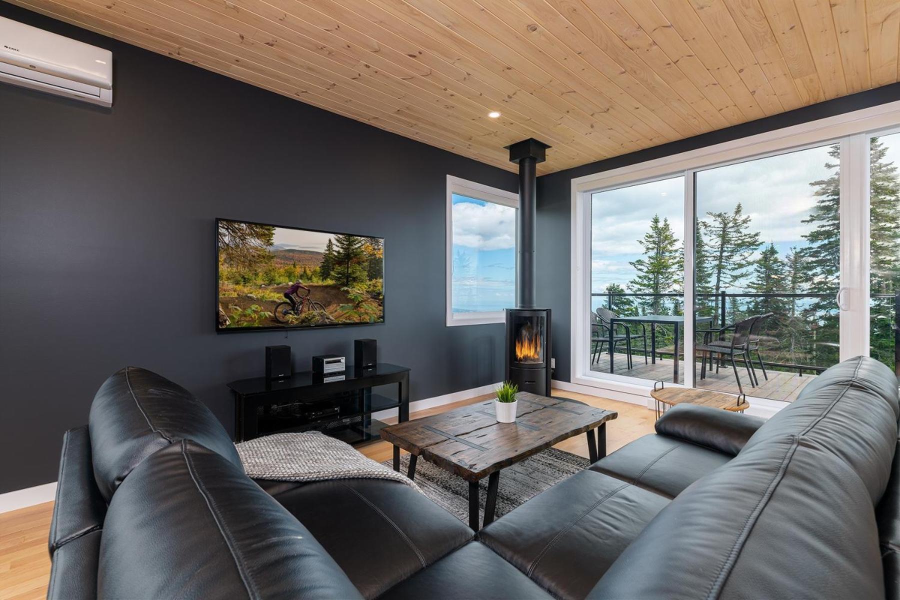 Les Chalets Du Massif De Charlevoix Петит-Ривьер-Сен-Франсуа Номер фото